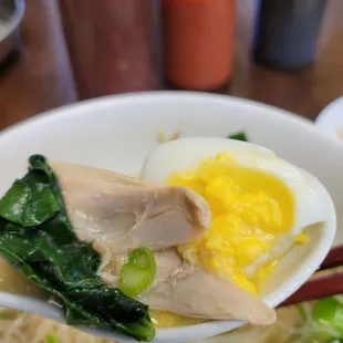 A choice spoonful from the chicken fit bowl. Good with a sprinkle of the chili vinegar.