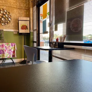 a table and chairs in a restaurant