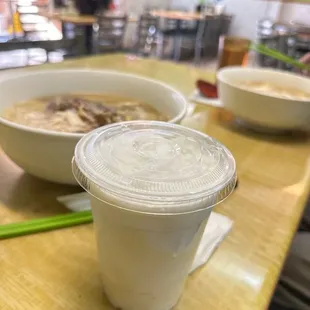  two bowls of soup on a table