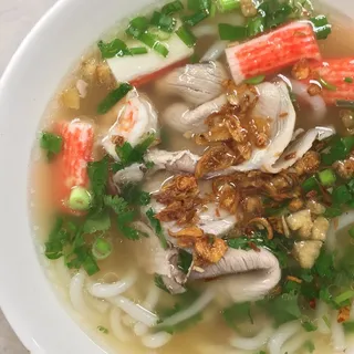 25. Seafood and Pork Meat Combination with Rice Noodle Soup