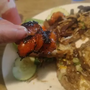 All the shrimp were burnt, and over cooked.