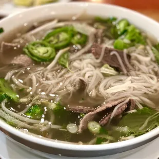 a bowl of beef and vegetable soup