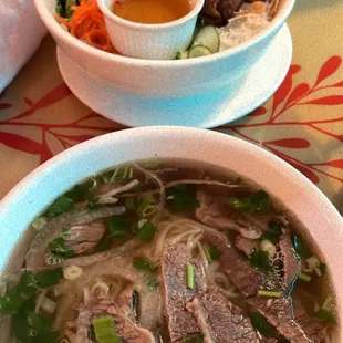 Egg roll vermicelli and beef broth pho with well don't brisket and tripe