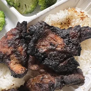 Burned Pork chop over rice