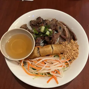 Pork vermicelli bowl with egg roll. Delicious!