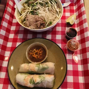 $10 Lunch Special Beef Pho, Shrimp Spring Rolls with Peanut Sauce, and a medium drink.