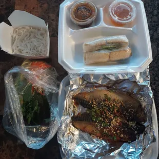 My to go Donner. Mackerel with noodles veggies and tofu spring rolls