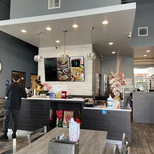 a man standing in a restaurant