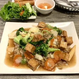 Number 84 with Tofu over Fried Rice Noodles. Yum!