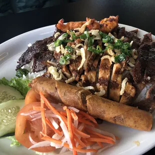 B1. Combination of Grilled Pork, Chicken, Beef, Shrimp and Eggrolls Bowl (BUN DAC BIET)