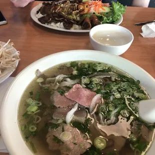 a bowl of soup with meat and vegetables