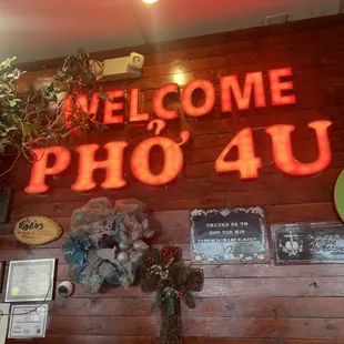 the welcome sign for pho 4 u