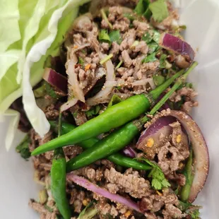 Cook beef larb