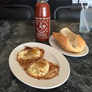 Fried egg sandwich appetizer.  Baguette is soft on inside, crunchy outside, and hot &amp; fragrant.  Egg yolk breaks wonderfully.