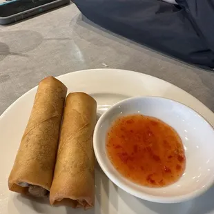 Eggrolls severed with sweet chili sauce