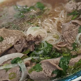 a bowl of beef and vegetable soup