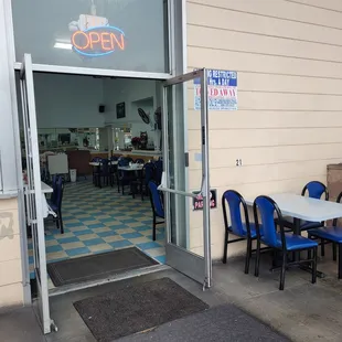 the entrance to a restaurant