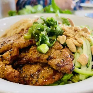 a plate of chicken and vegetables