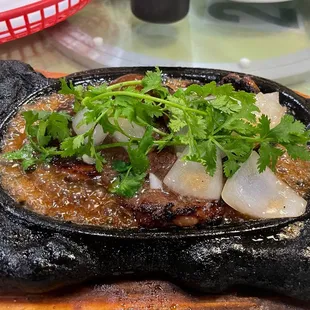 a dish of meat and vegetables