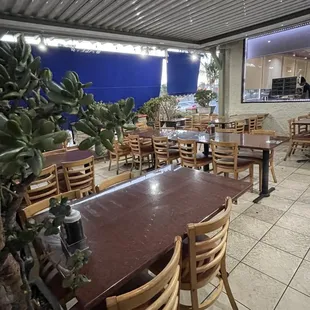 a restaurant with tables and chairs