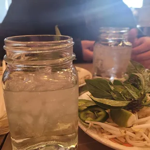 Water in Mason jars and accoutrements.