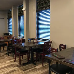 a restaurant with tables and chairs