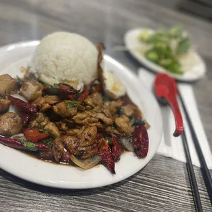 a plate of food with rice and vegetables