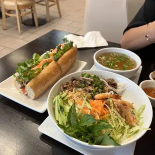 B1. Rice Vermicelli Special BM3. Lemongrass Grilled Pork Bread S10. Bowl of Soup