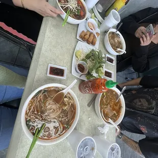 Fried pork egg rolls and rare steak pho