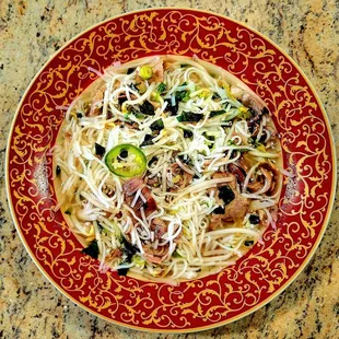 Pho#4 Tái, Chín, Nạm, Gân, Sách. Reg size. This bowl holds 26 ounces. There's 2 lbs of pho here after everything is put together.