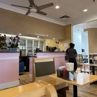 a man standing in a restaurant