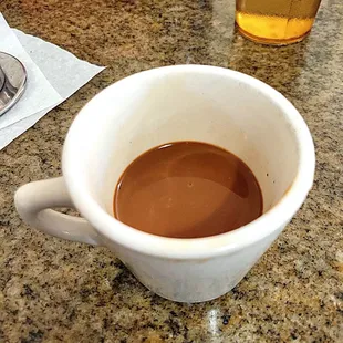 Aftering stirring the coffee and condensed milk. The milk was at the bottom of the mug.
