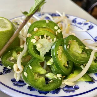 Jalapeño, basil and sprouts served with the soup