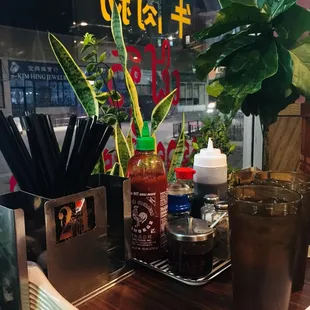 a table with a variety of condiments