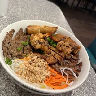 1B. Noodle bowl with grilled beef, pork, chicken, shrimp, egg rolls or tofu