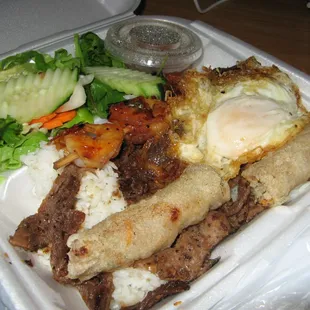 Shrimp, Salad, Rice, Fried Egg, Egg Roll, and Beef