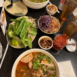 a variety of vietnamese food on a table