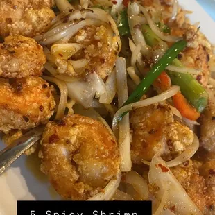 a plate of shrimp and vegetables