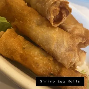 shrimp egg rolls on a plate