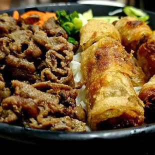 Grilled pork bun with egg rolls