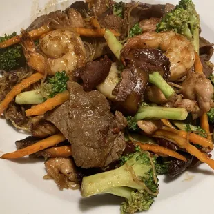 Combo or mix chicken, beef, and seafood sot egg noodles - stir fried.