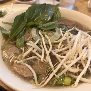 a bowl of beef and noodles