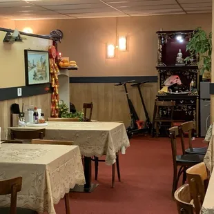 a restaurant with tables and chairs
