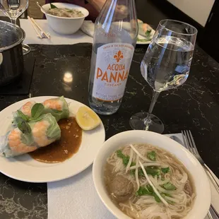your basic beef pho with fresh shrimp spring rolls.  Panini water not included.