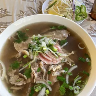 Pho with 25. Rare Steak and Well Done Flank Noodle Soup