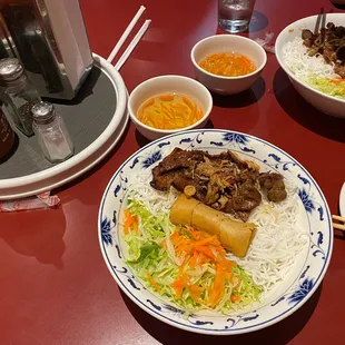 a plate of food on a red table