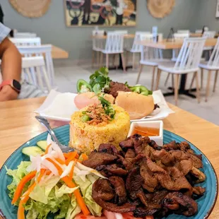 R1 grilled pork rice platter ($15) and BM1 banh mi with grilled pork ($10)