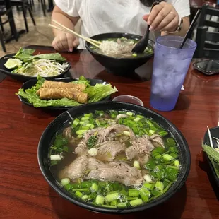 Pho with rare steak and fatty brisket Fried eggrolls