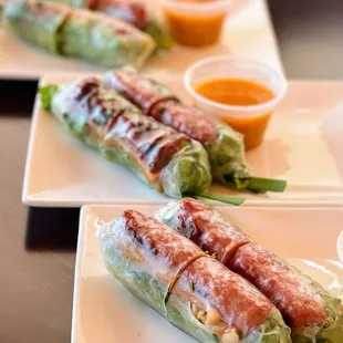 two rolls of food on a plate