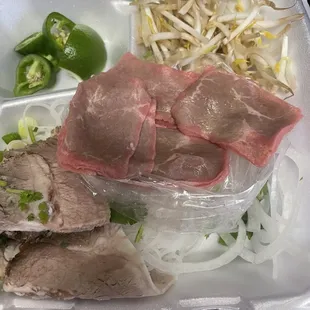 Rare steak and brisket pho